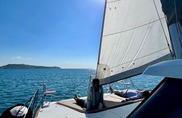 Catamaran tour stops bathing and snorkeling toast with prosecco