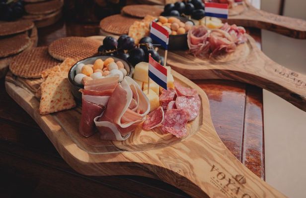 Amsterdam 2 Hour Small-Group Canal Cruise with Dutch Snacks & Bar