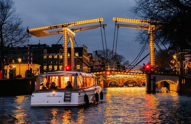 Explore Amsterdam's Canals Aboard a Cozy Small Group Cruise