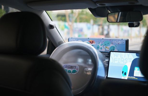 Guangzhou: Self-Driving Robotaxi Experience with Guide