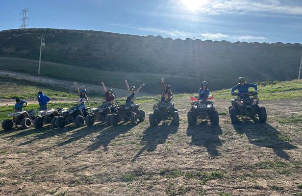 Ride in four-wheelers/paintball mountains of Rosarito & tacos