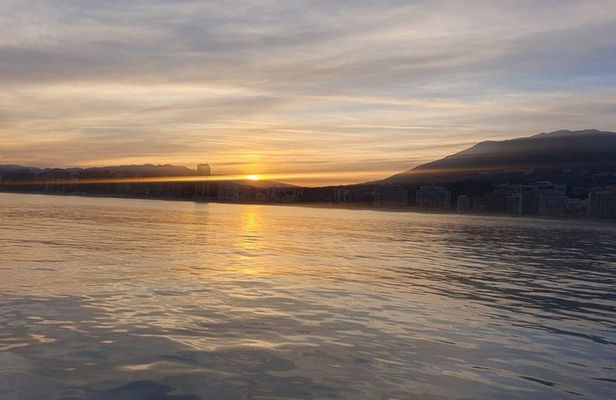 Sunset on Luxury Yacht Includes a Drink