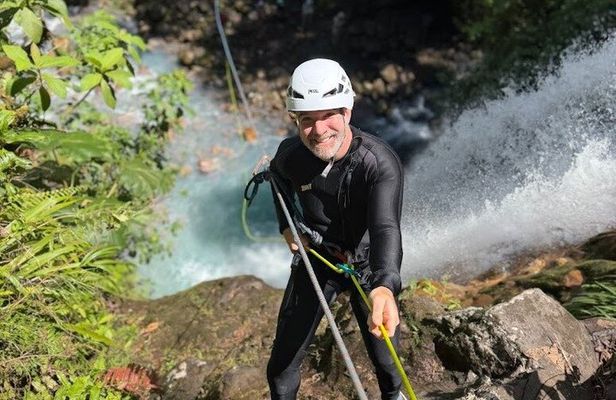 Essential Blue Falls Canyoning Adventure: 2 Rappels & Slides