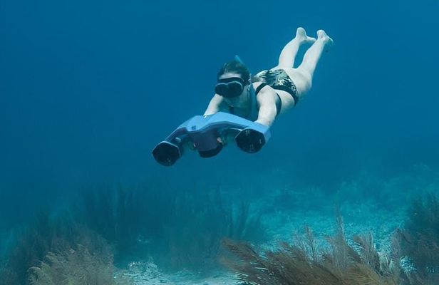 Snorkeling with sea scooters and scenic boat ride