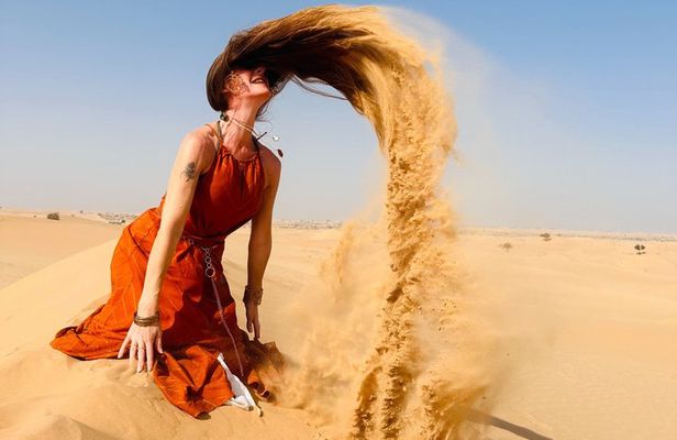 Abu Dhabi Desert Safari with Sandboarding, Camel Ride & Dinner